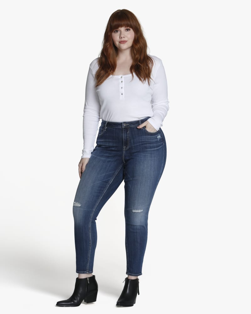 Plus size model wearing Emberly Distressed Skinny Jean by Vigoss | Dia&Co | dia_product_style_image_id:133535